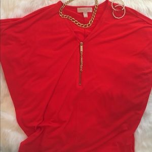 Michael KORS orange top with gold zipper pul